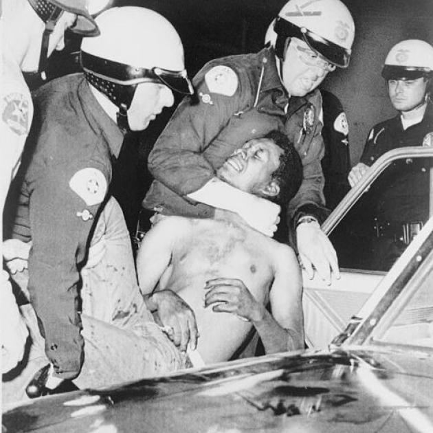 Police strangling a black man at Watts riot