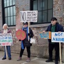 People holding signs