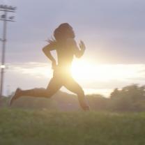 Silhouette of woman running