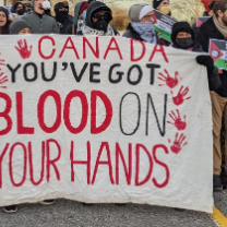 Sign saying Canada You've Got Blood on your Hands