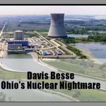 A large conical shaped cement building with other little buildings around and river of water leading to it with the words Davis Besse Ohi's Nuclear Nightmare