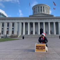 Statehouse and Repeal HB6 sign