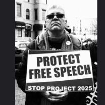  Man holding a sign saying Protect Free Speech Stop Project 2025