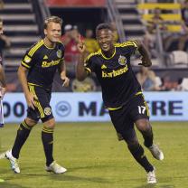 Two guys playing soccer