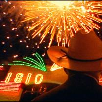 Fireworks and a guy in cowboy hat