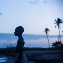 Boy standing on beach