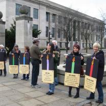 Members of Jewish Voice for Peace hold a symbolic menorah against racism and Islamophobia at the Ohio State University. 