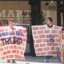 Protesters demontrate across the street from Donald Trump’s town hall at the Columbus Convention Center on August 1.